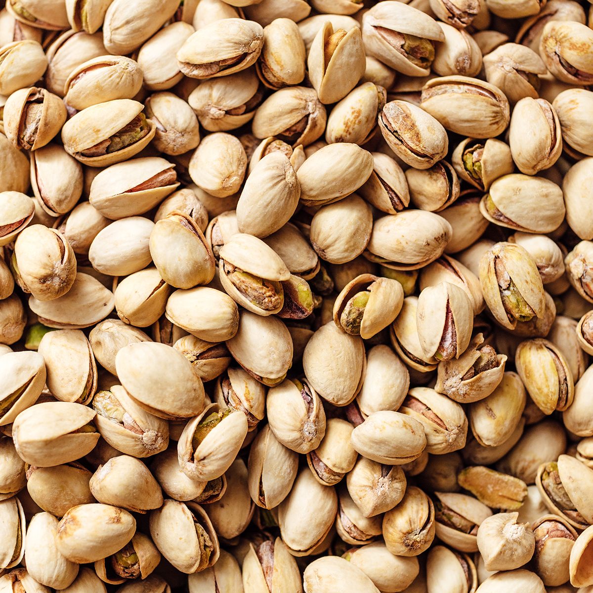 Pistachio texture. Nuts. Close-up of pistachio. Salted pistachio - beer snack.