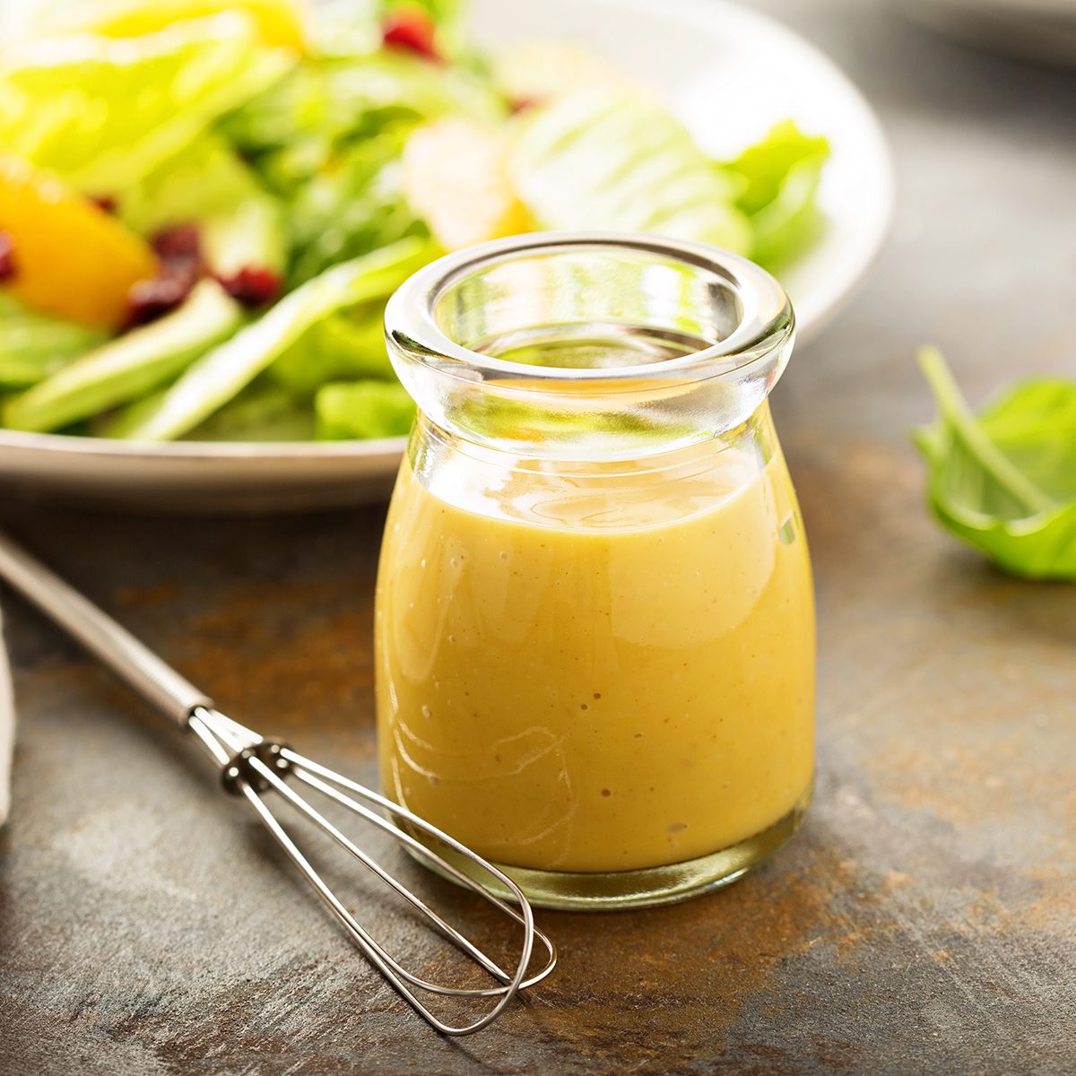 Homemade honey mustard salad dressing in a jar