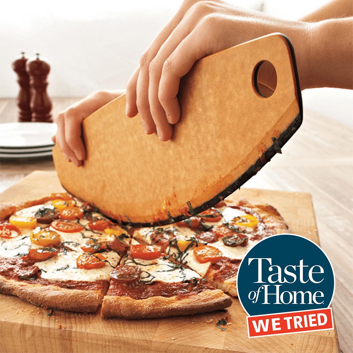 https://www.tasteofhome.com/wp-content/uploads/2020/06/Rocking-Pizza-Cutter_ecomm_via-surlatable.com_.jpg?fit=700%2C700
