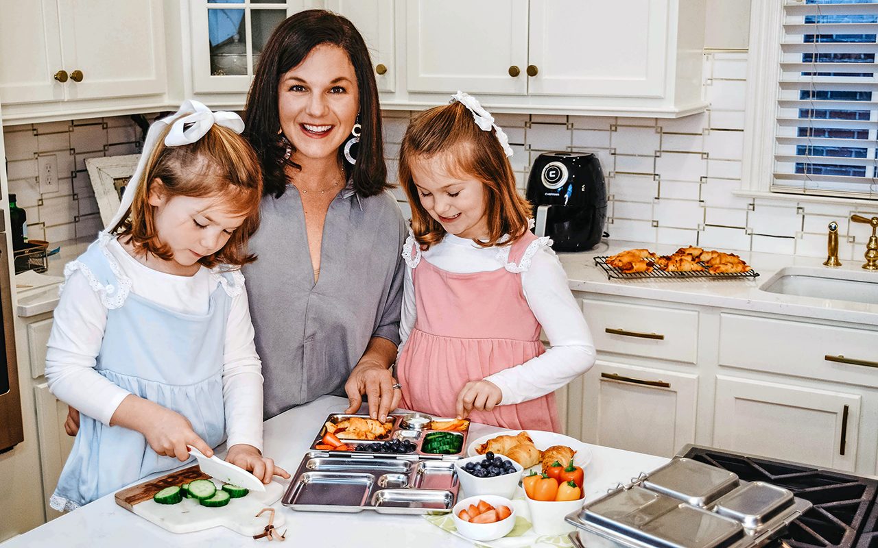 Holley Grainger cooking with daughters in her kitchen