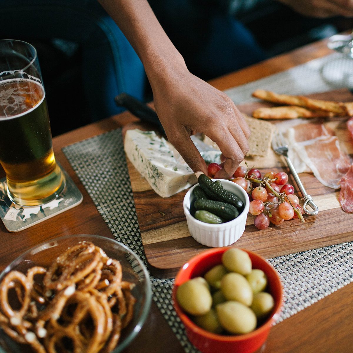 Indulging in a charcuterie at a house party