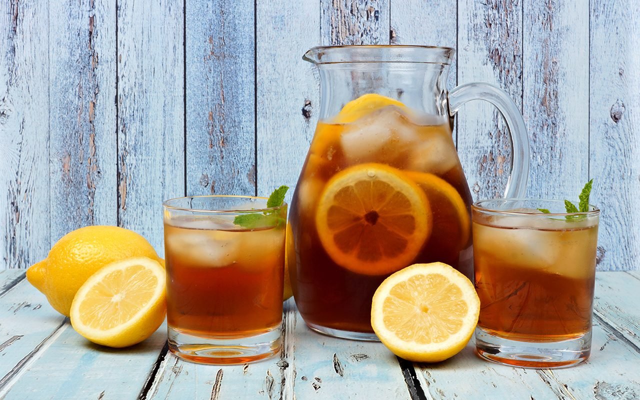 https://www.tasteofhome.com/wp-content/uploads/2020/08/pitcher-of-iced-tea-with-two-glasses-on-rustic-blue-690507662.jpg