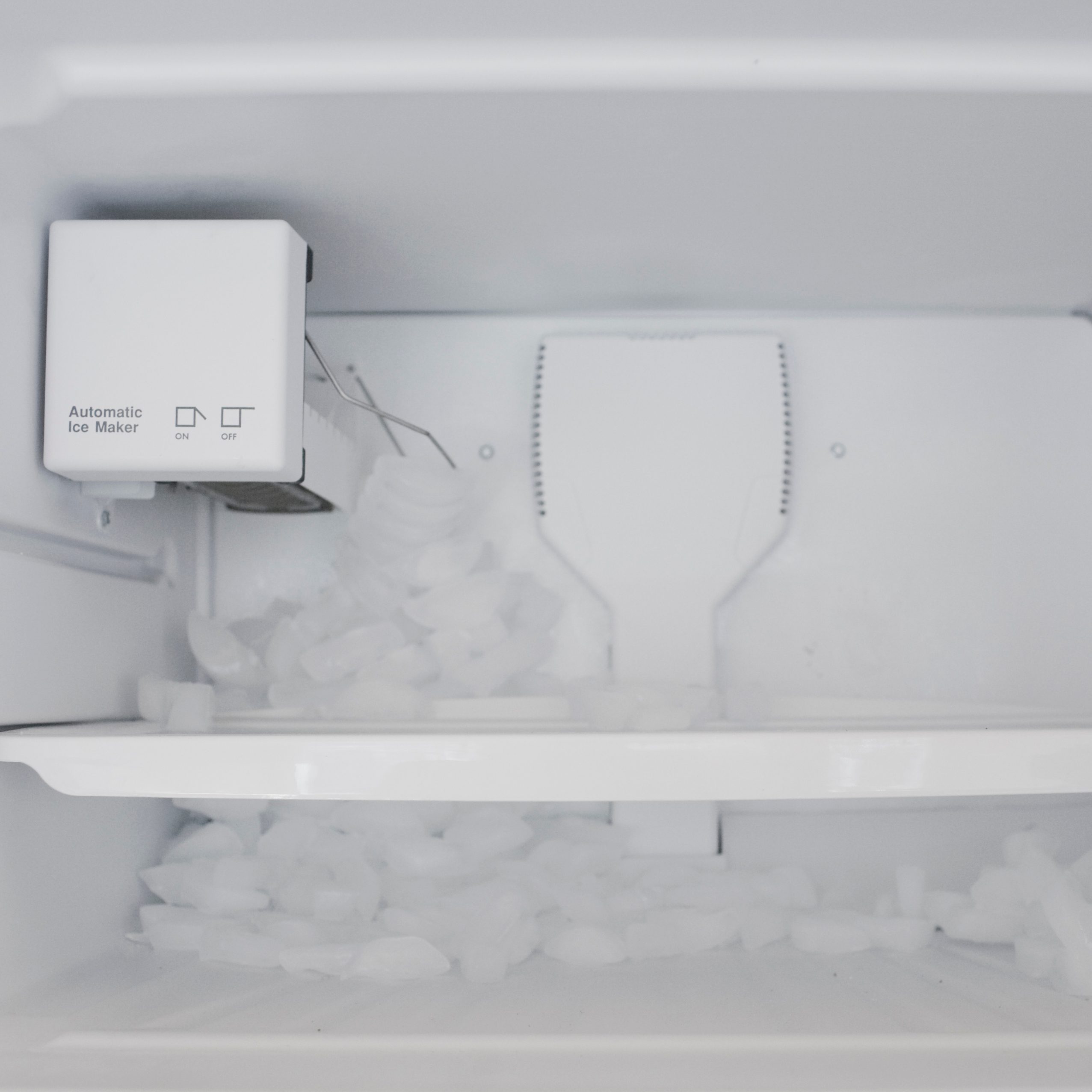 spilling ice in freezer