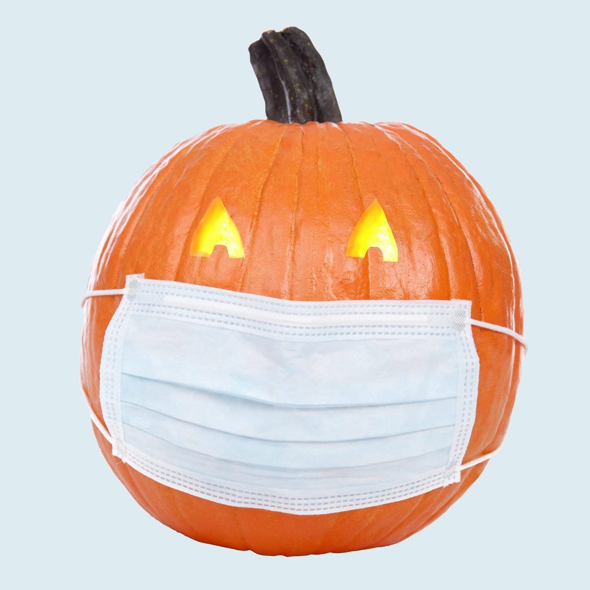 Jack-o-lantern wearing a face mask