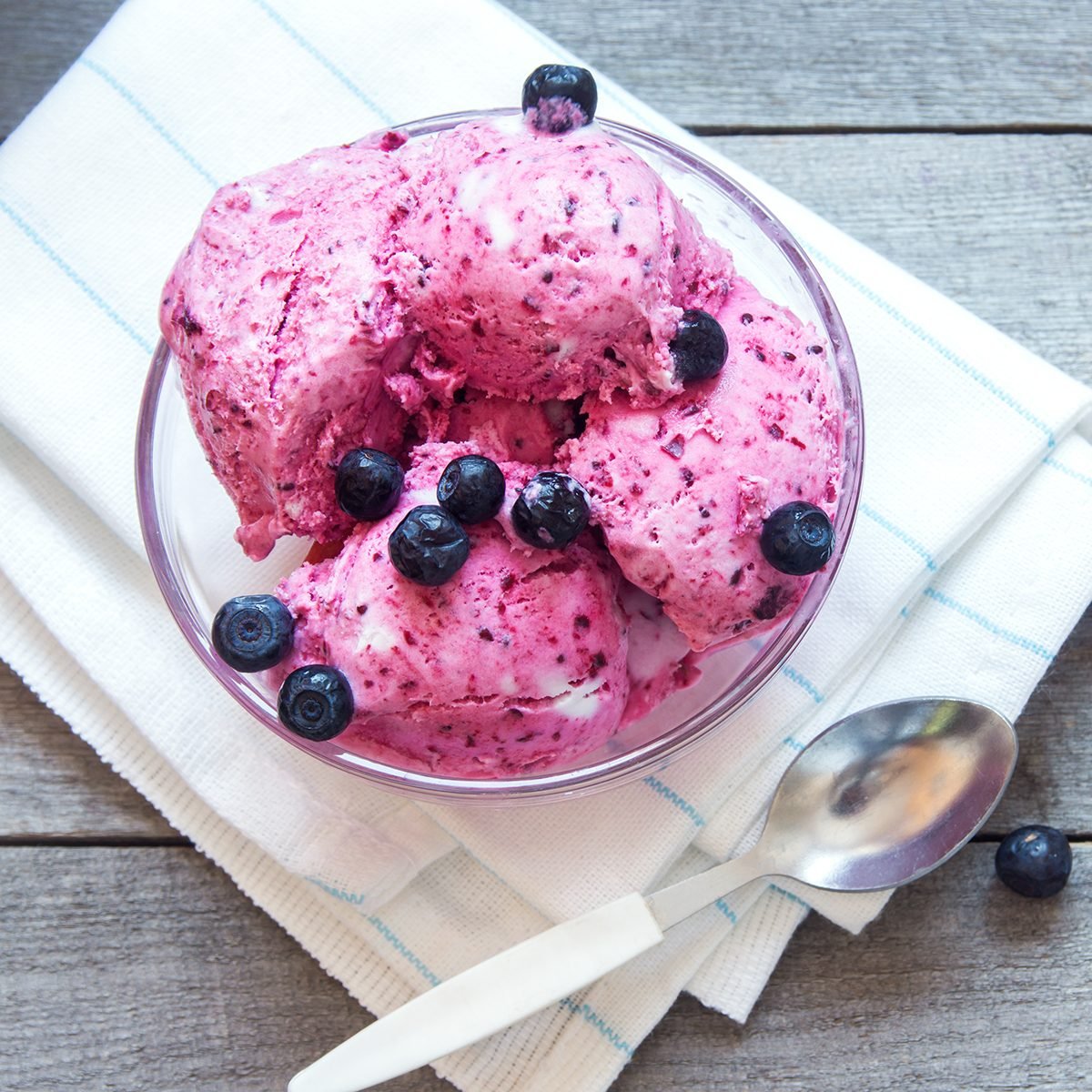 Healthy homemade raw vegan banana and berry ice cream (icecream, nicecream) topped with organic blueberries - healthy vegetarian diet vegan raw fruit organic delicious dessert, dairy free, gluten free