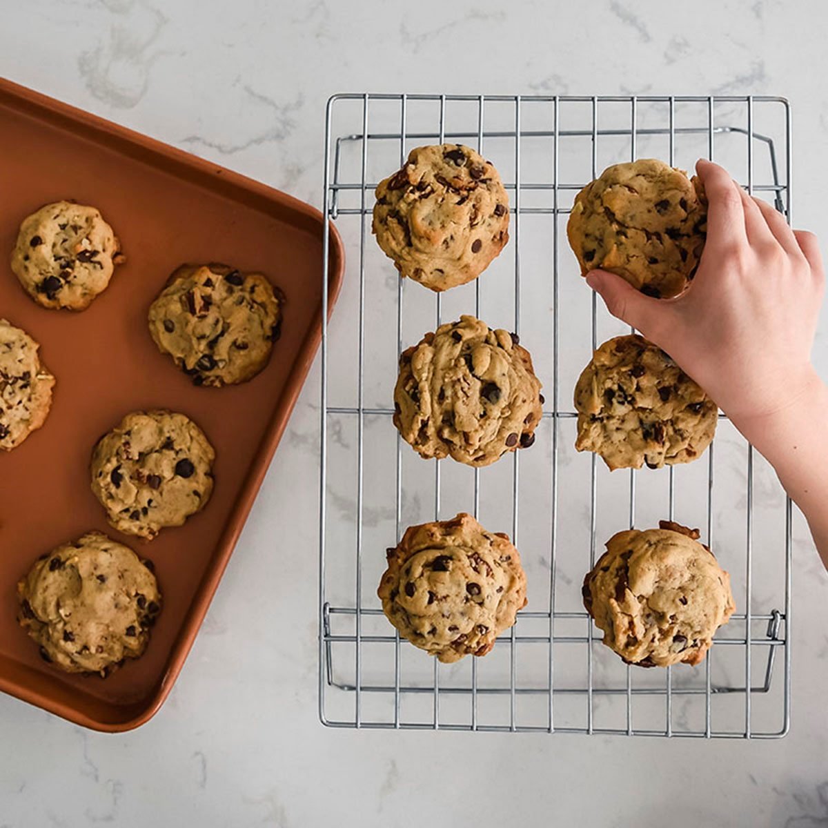 https://www.tasteofhome.com/wp-content/uploads/2020/12/hand-of-young-child-reaching-to-take-a-cookie-off-1140364625.jpg?fit=700%2C700