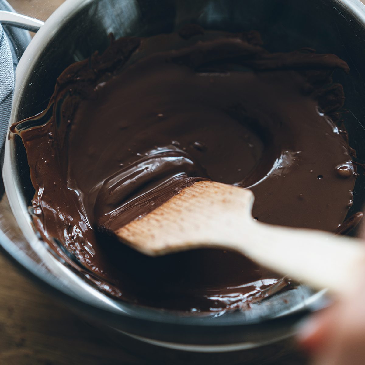 cookie decorating tips Chocolate Pudding In Wooden Spoon On The Cooker