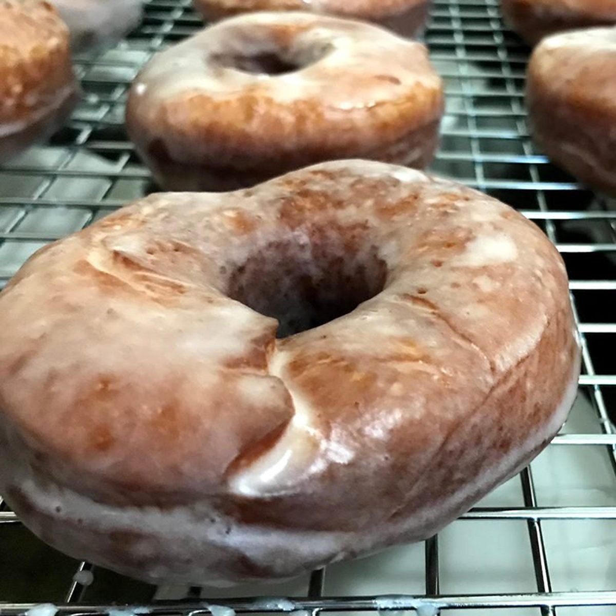 Glazed donuts on a rack