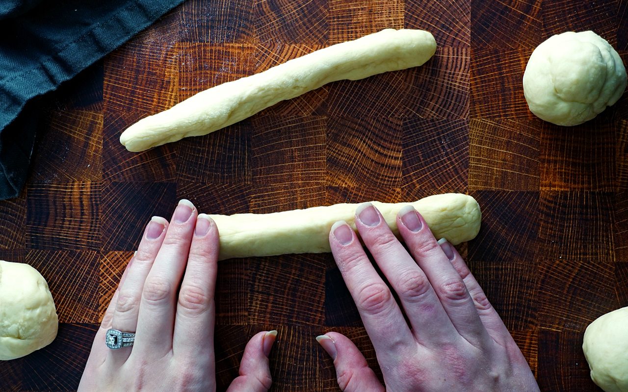 copycat olive garden breadsticks shaping breadstick dough into rods