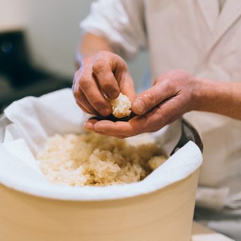 how to make sushi rice Sushi Chef Making Artisanal Nigiri Zushi At Bar, Tsukiji