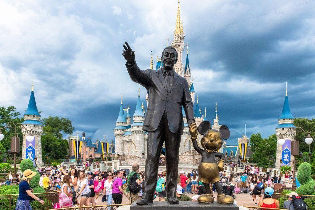 Walt Disney and Mickey Mouse statue inside of the Magic...