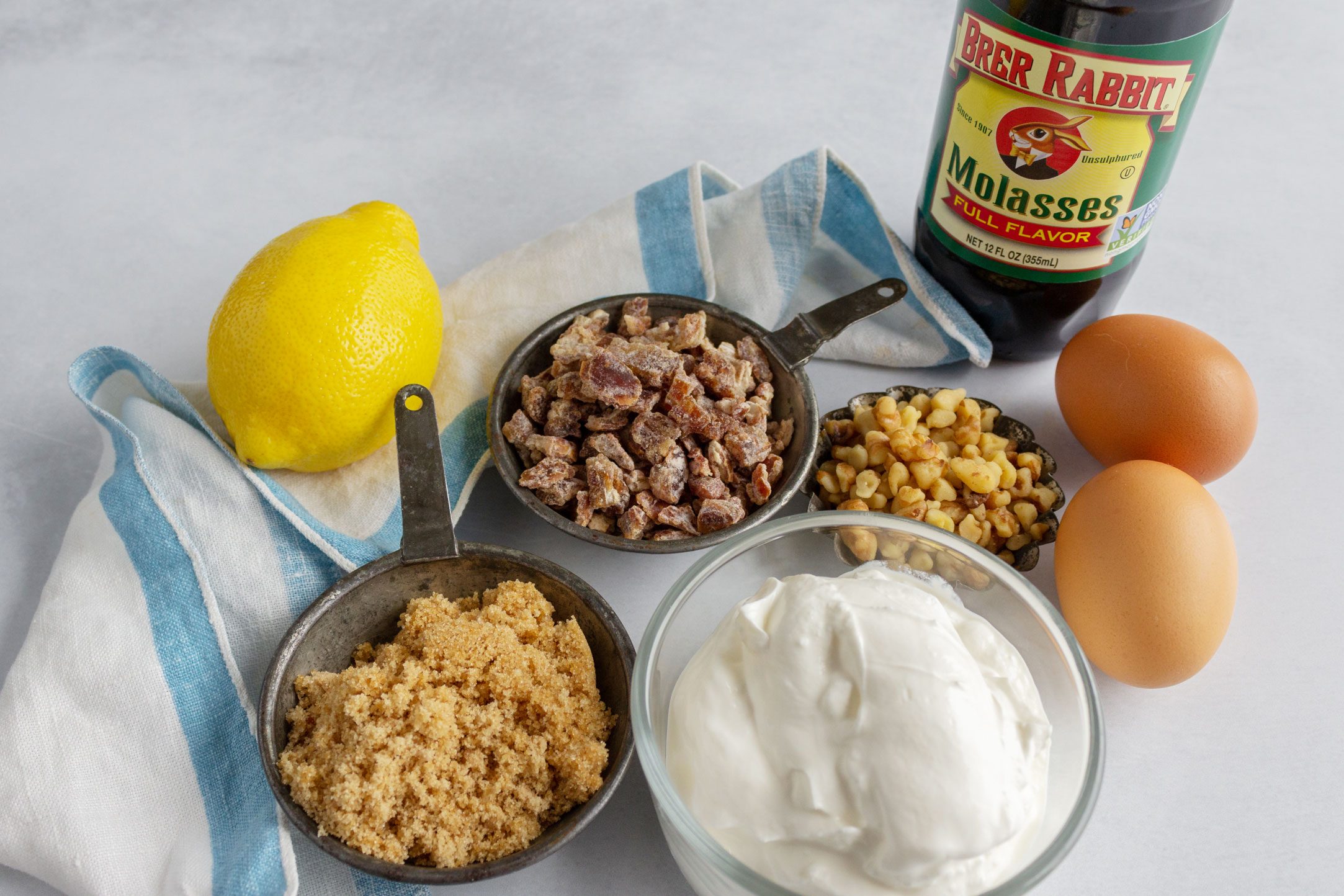 Lemon Frosted Fruit Bars ingredients laid out on marble kitchen countertop