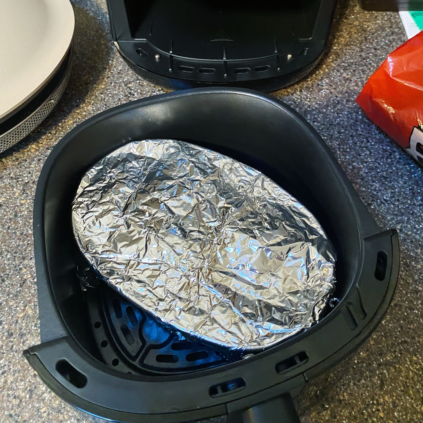 The Effortless Foil Hack For A Non-Stick Cooking Experience