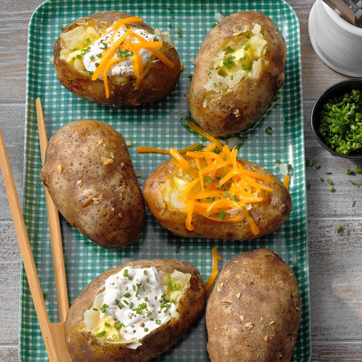 Baked potatoes stuffed with bacon, cheese and chives recipe | delicious.  Magazine