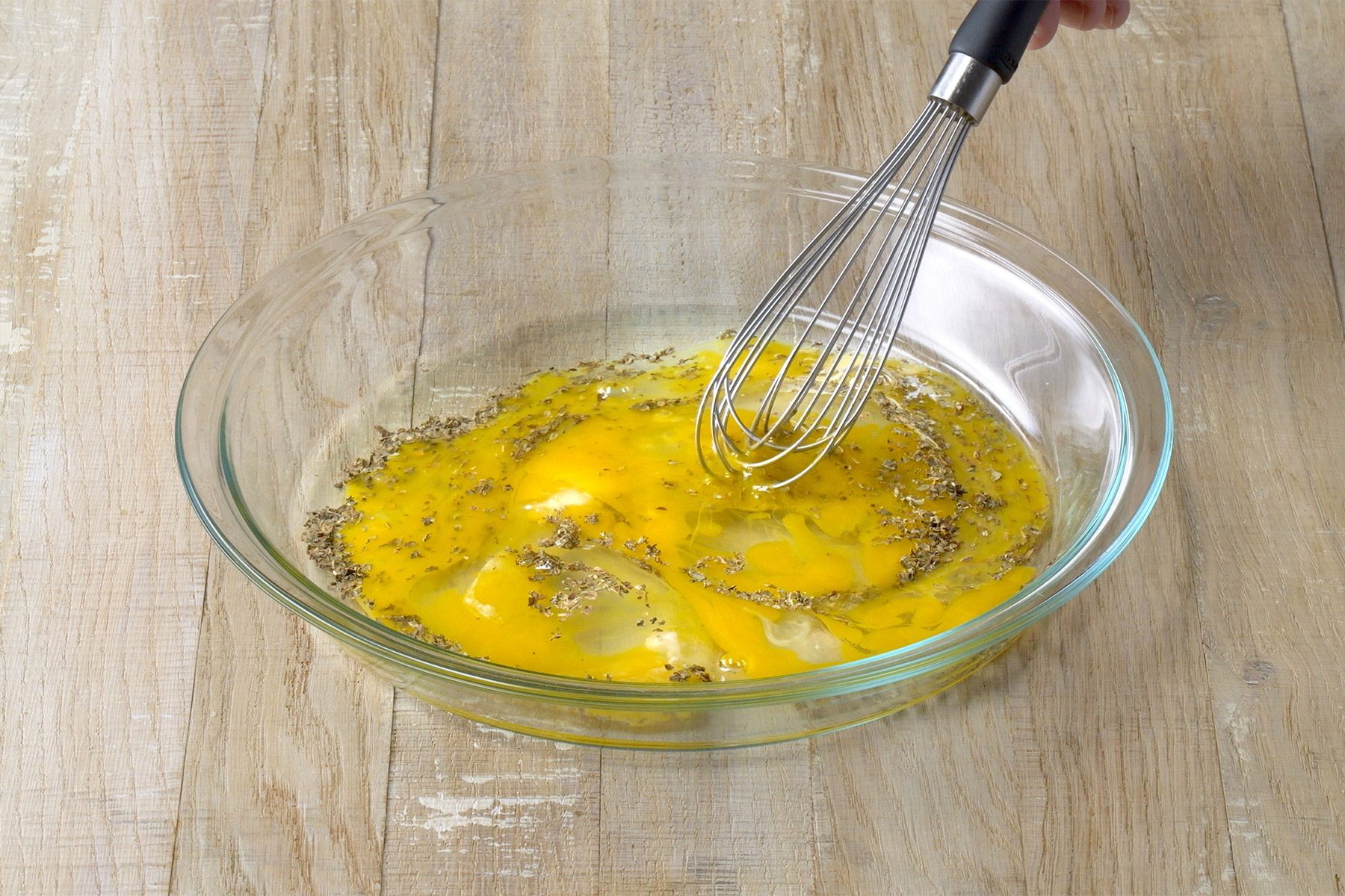 high angle shot of egg mixture in a plate