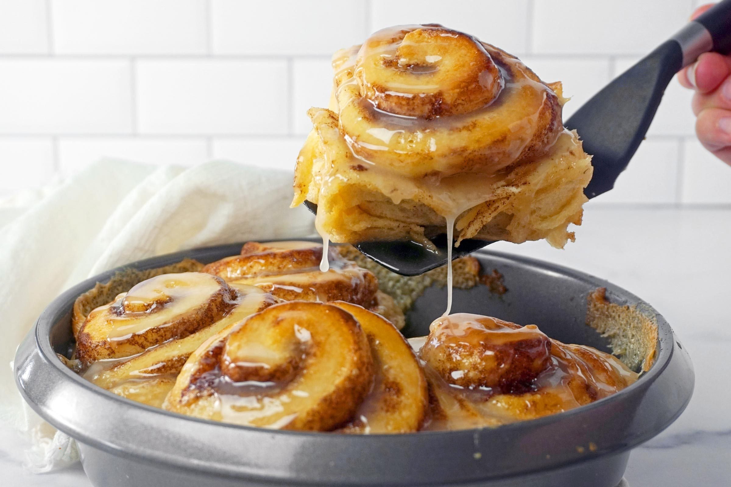 Tiktok Cinnamon Rolls being removed from the pan