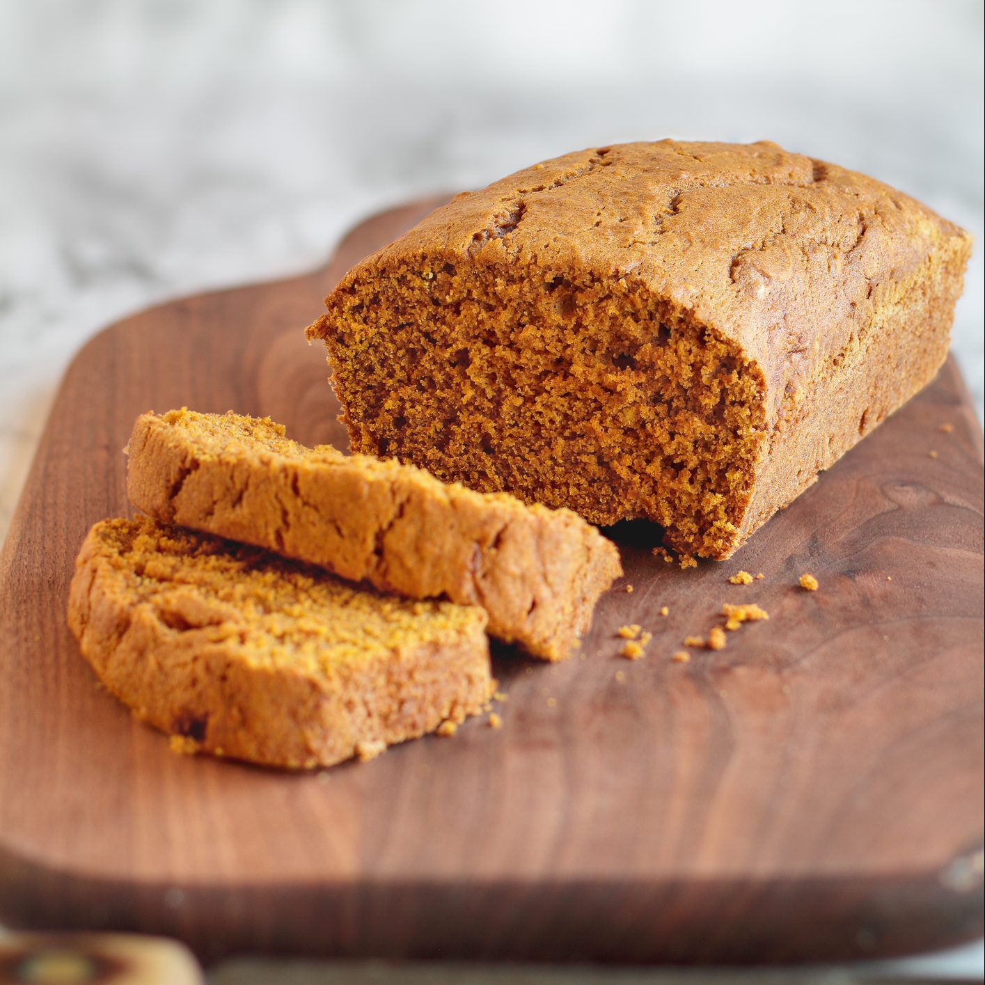 Pumpkin Bread Loaf on Cutting Board