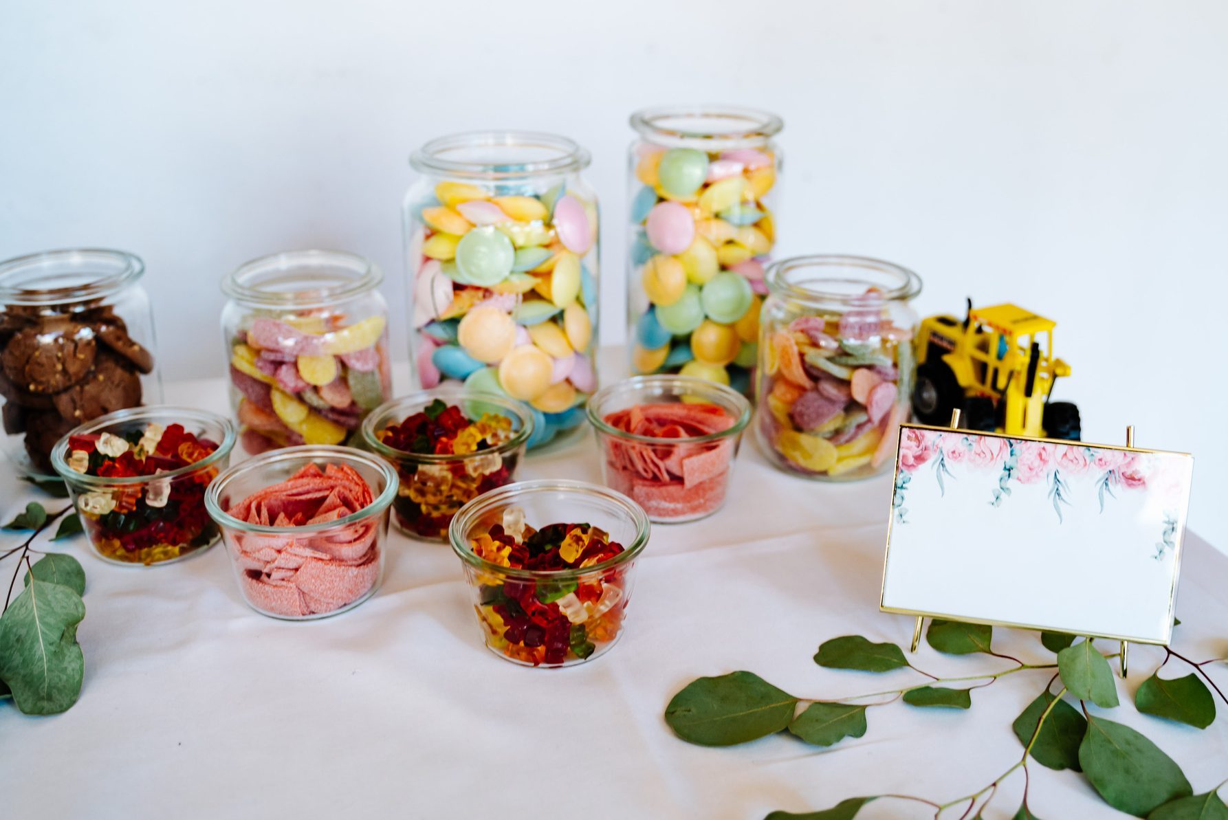 photo of candy bar jars on a table