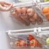 Maximize the Vertical Space in Your Fridge with This Genius Drawer Organizer
