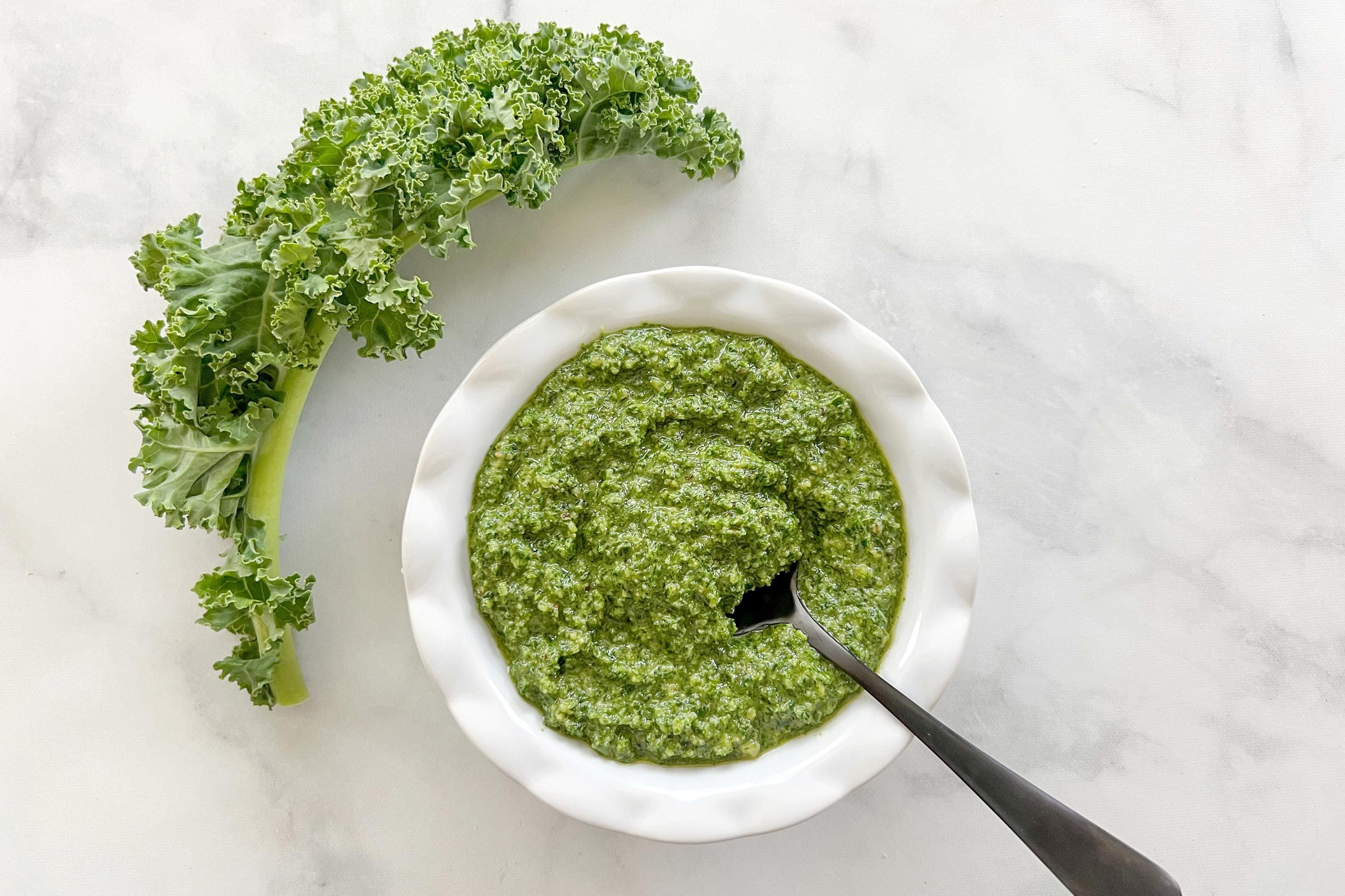 https://www.tasteofhome.com/wp-content/uploads/2023/03/Kale-pesto-2-Jenna-Urben-for-TOH.jpg?fit=700%2C1024