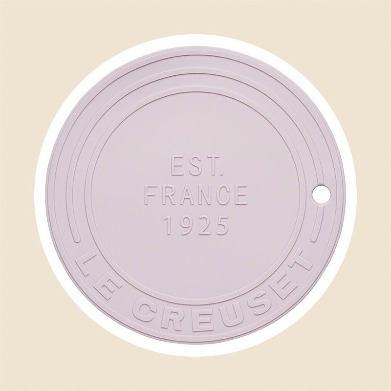 https://www.tasteofhome.com/wp-content/uploads/2023/04/Le-Creuset-Silicone-Trivet-in-Shallot_ecomm_via-lecreuset.com_.jpg?fit=700%2C700