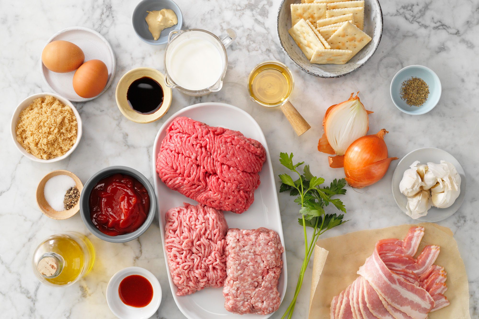 Bacon Wrapped Meat Load Overhead Shot Of All Ingredients On Marble Surface