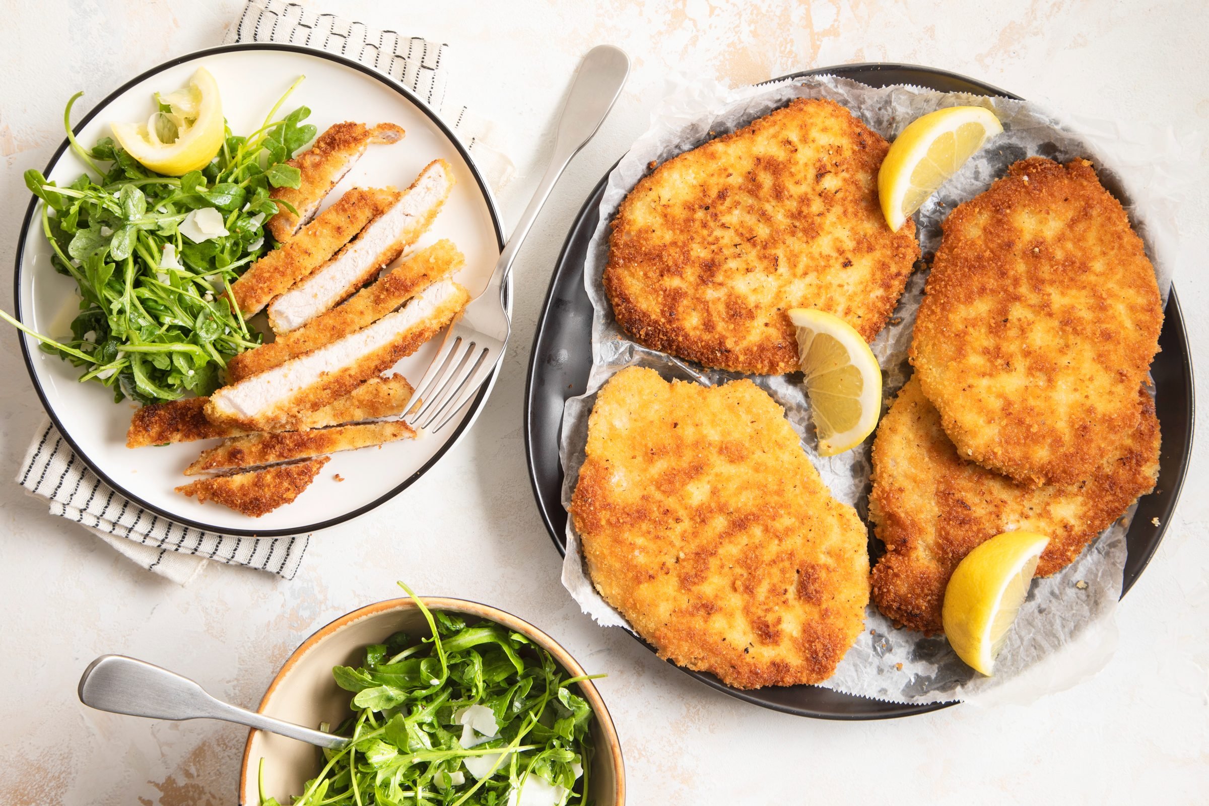 Pork Milanese on two plates