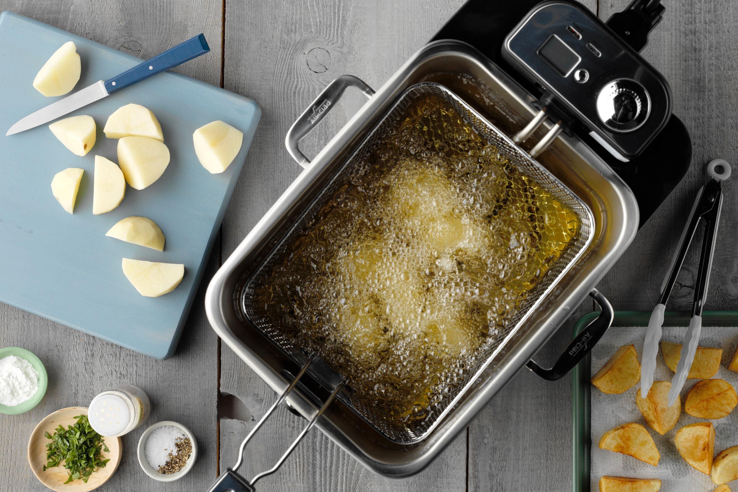 potatoes in a fryer making homemade tater tots