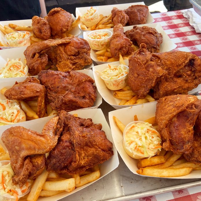 Fried Chicken with fries served in cardboard containers