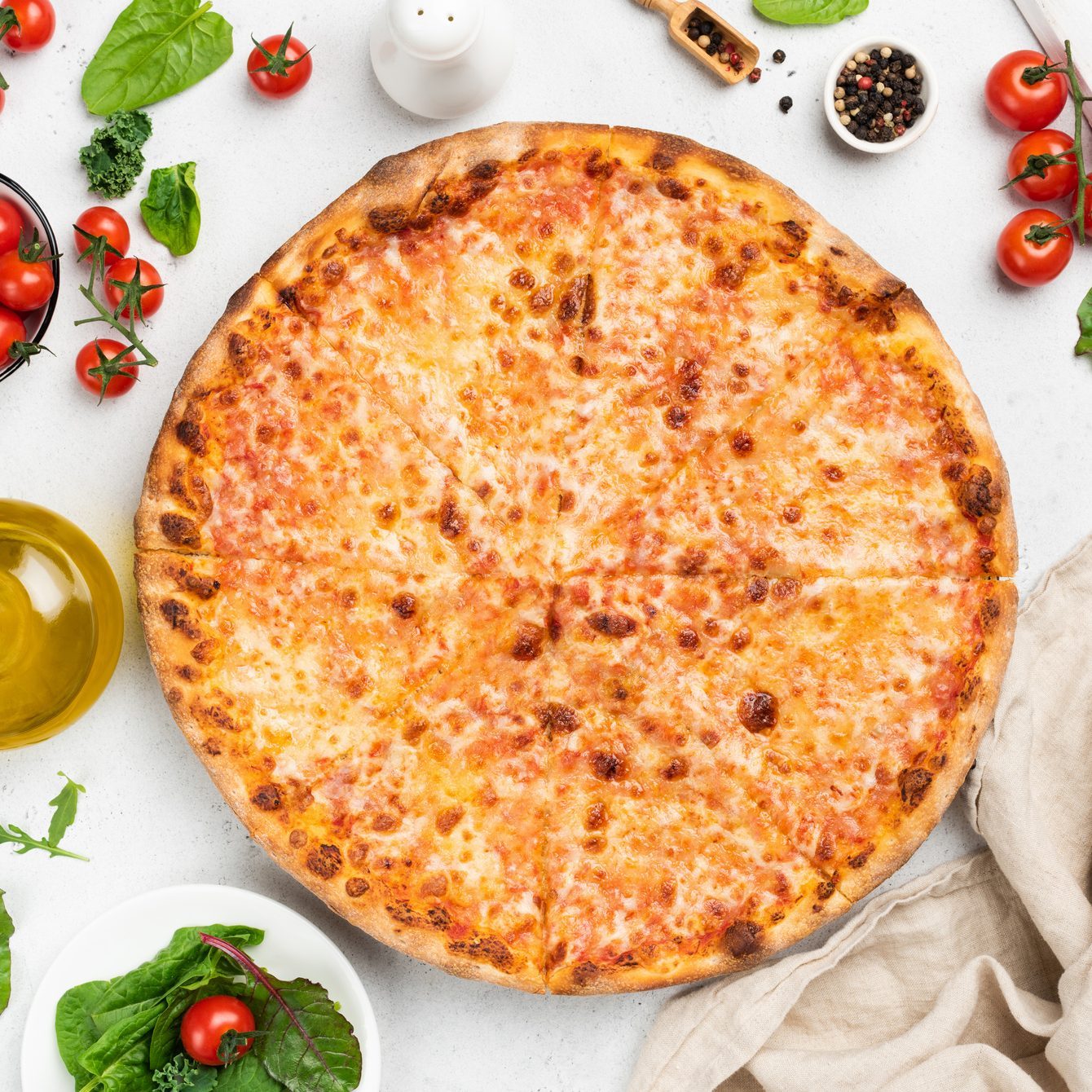 Tasty cheese pizza on white background top view