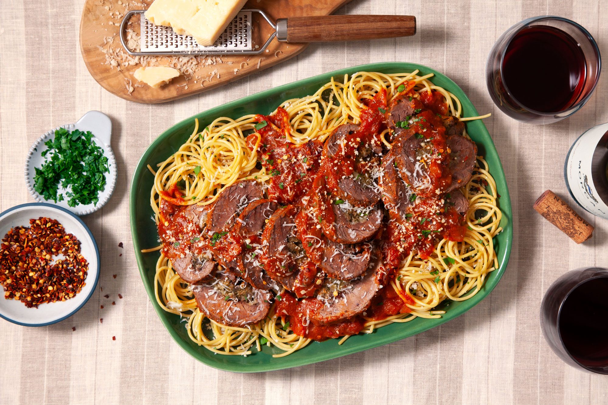 Serve Braciole over spaghetti with grated Parmesan cheese and minced fresh parsley