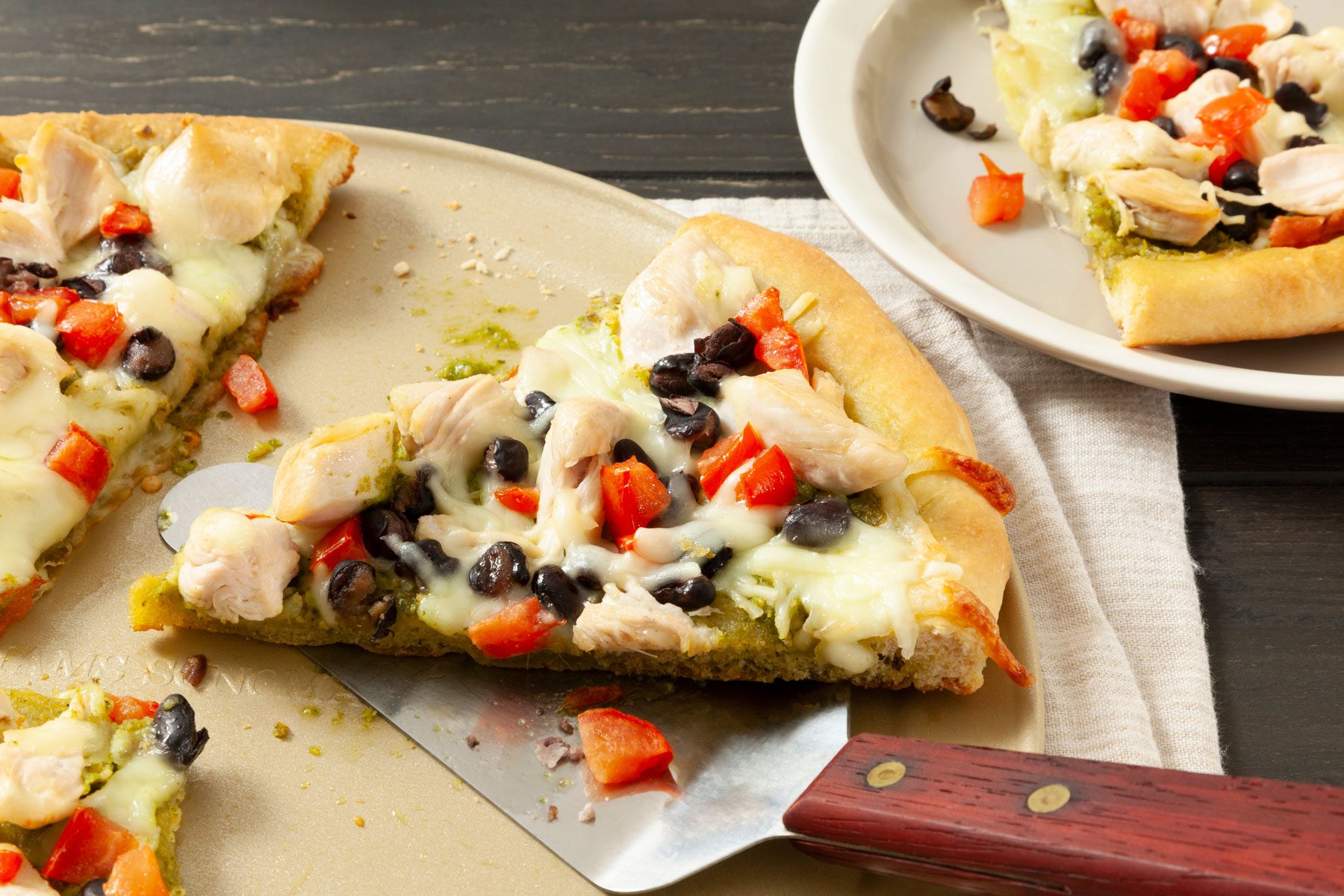 Chicken Pizza slices on a plate ready to serve