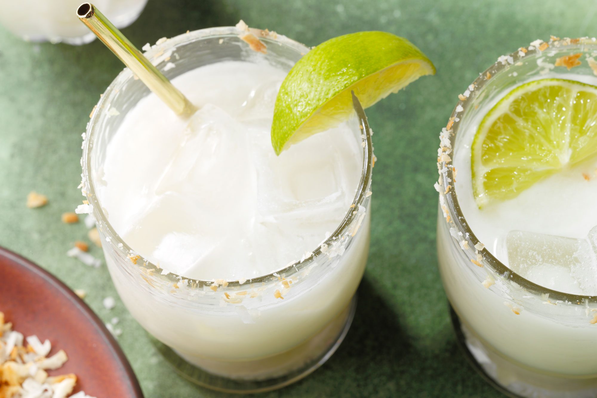 Coconut Margarita in short glass with lime