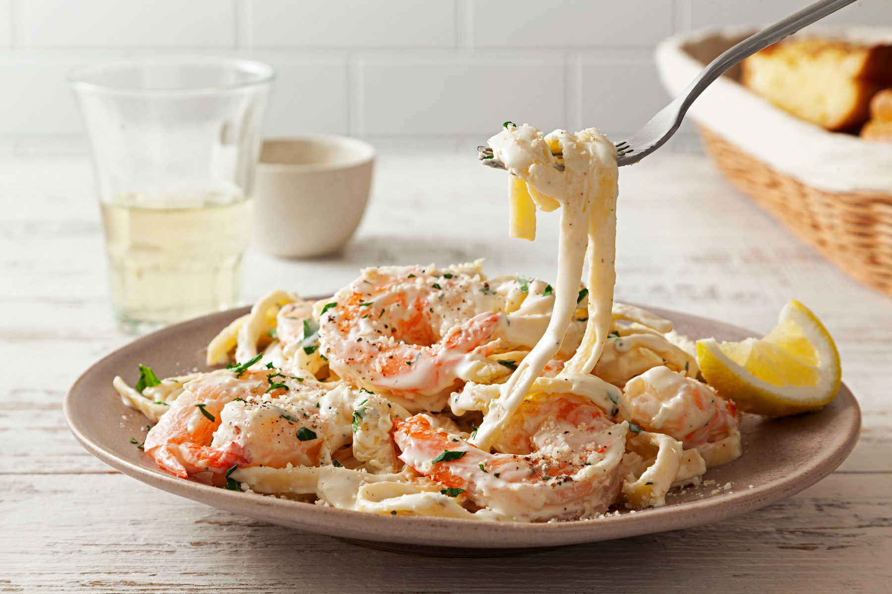 A plate of easy shrimp alfredo on a table