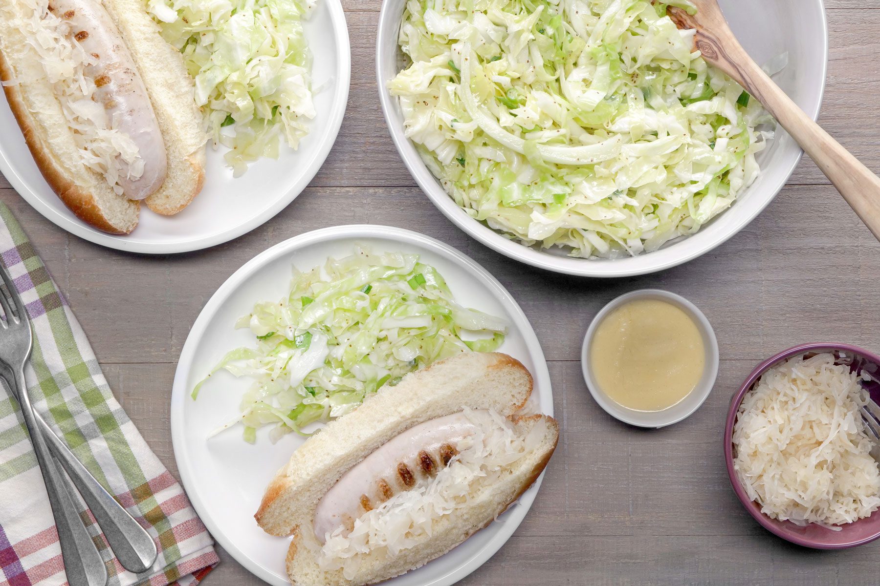 German Coleslaw spreved with bread in a small plates