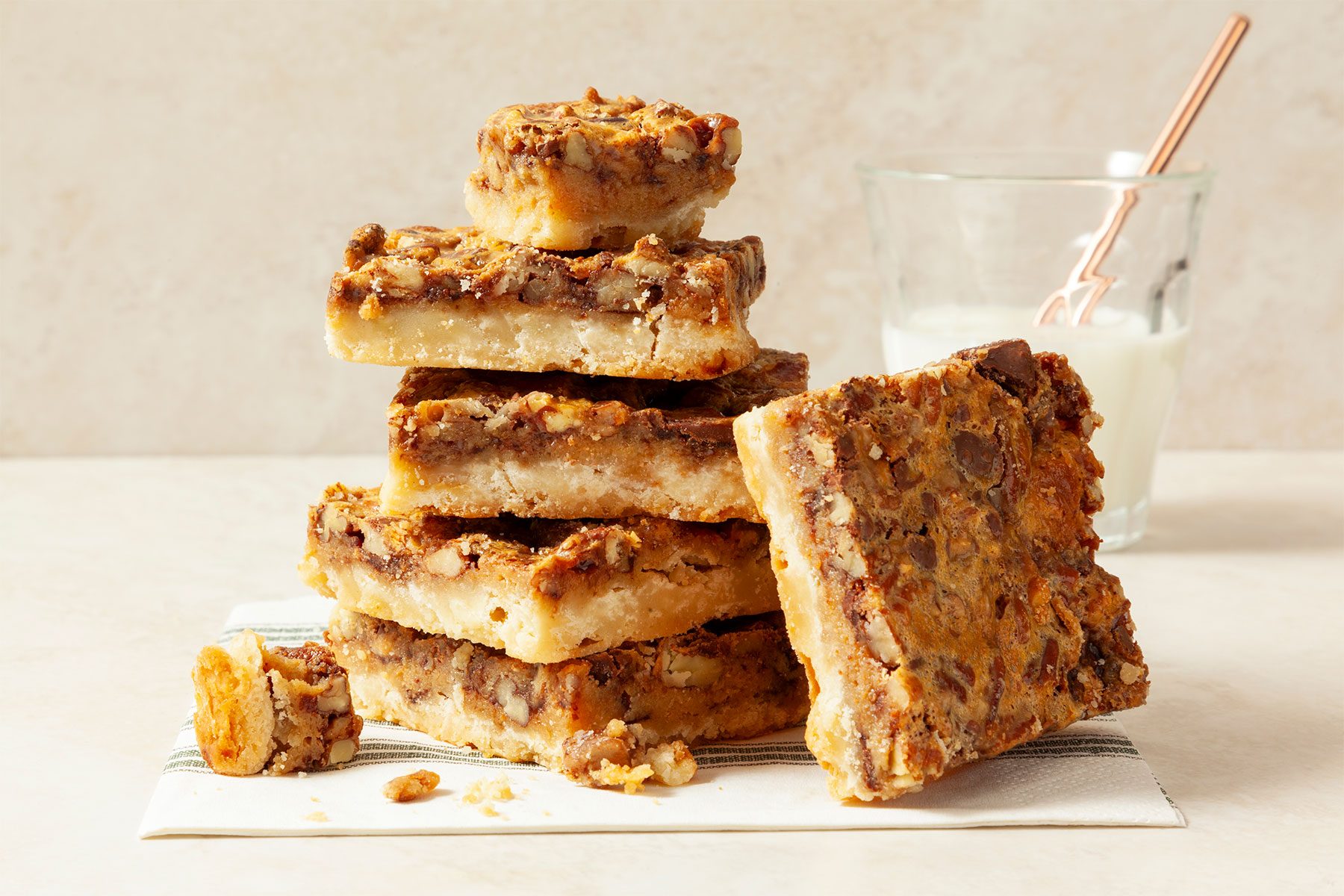Pecan Pie Bars piled upon each other