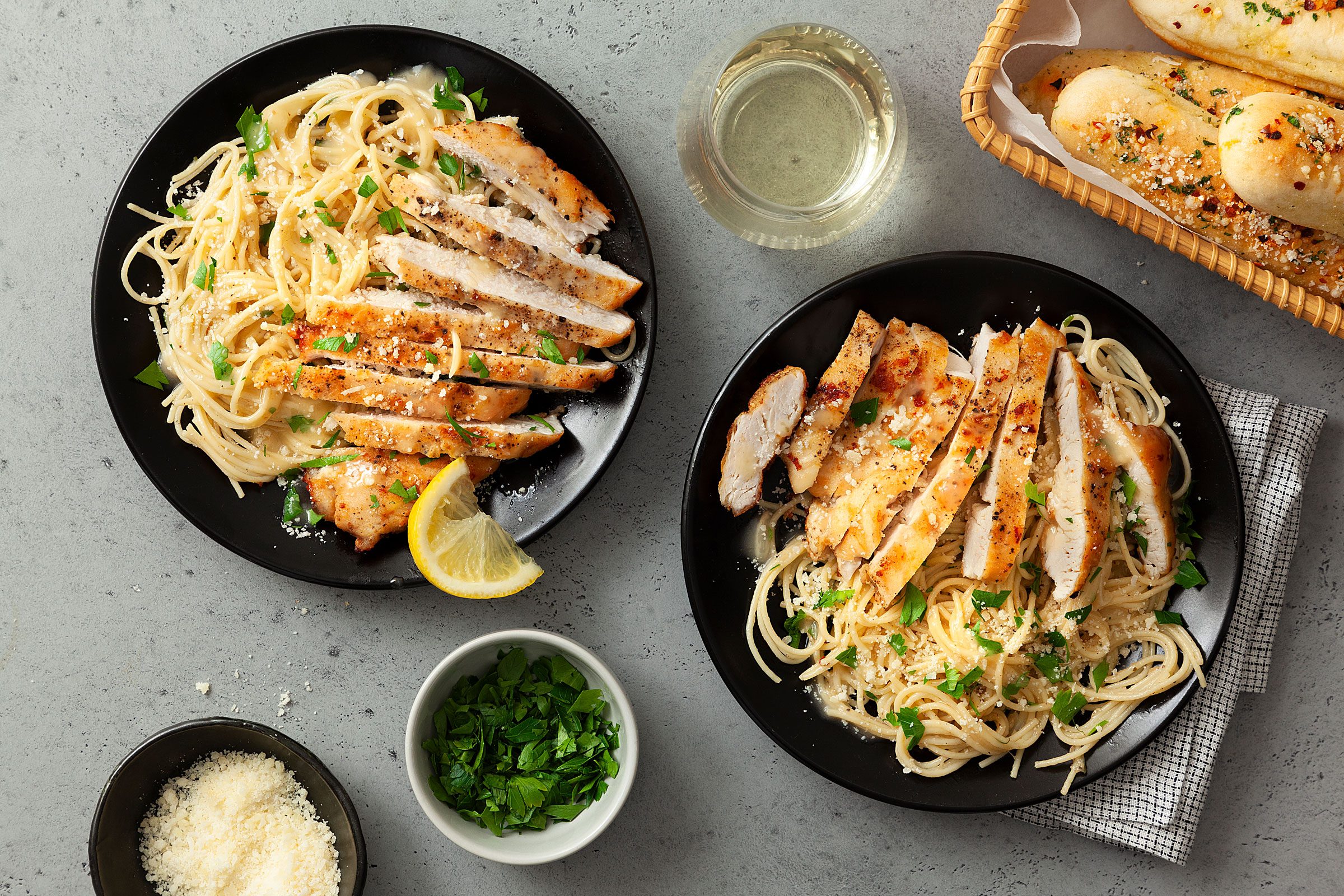 Lemon Chicken Pasta in two black bowls