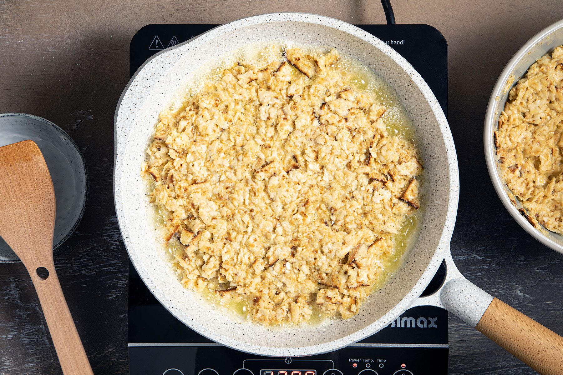 Cooking matzo and egg mixture in pan