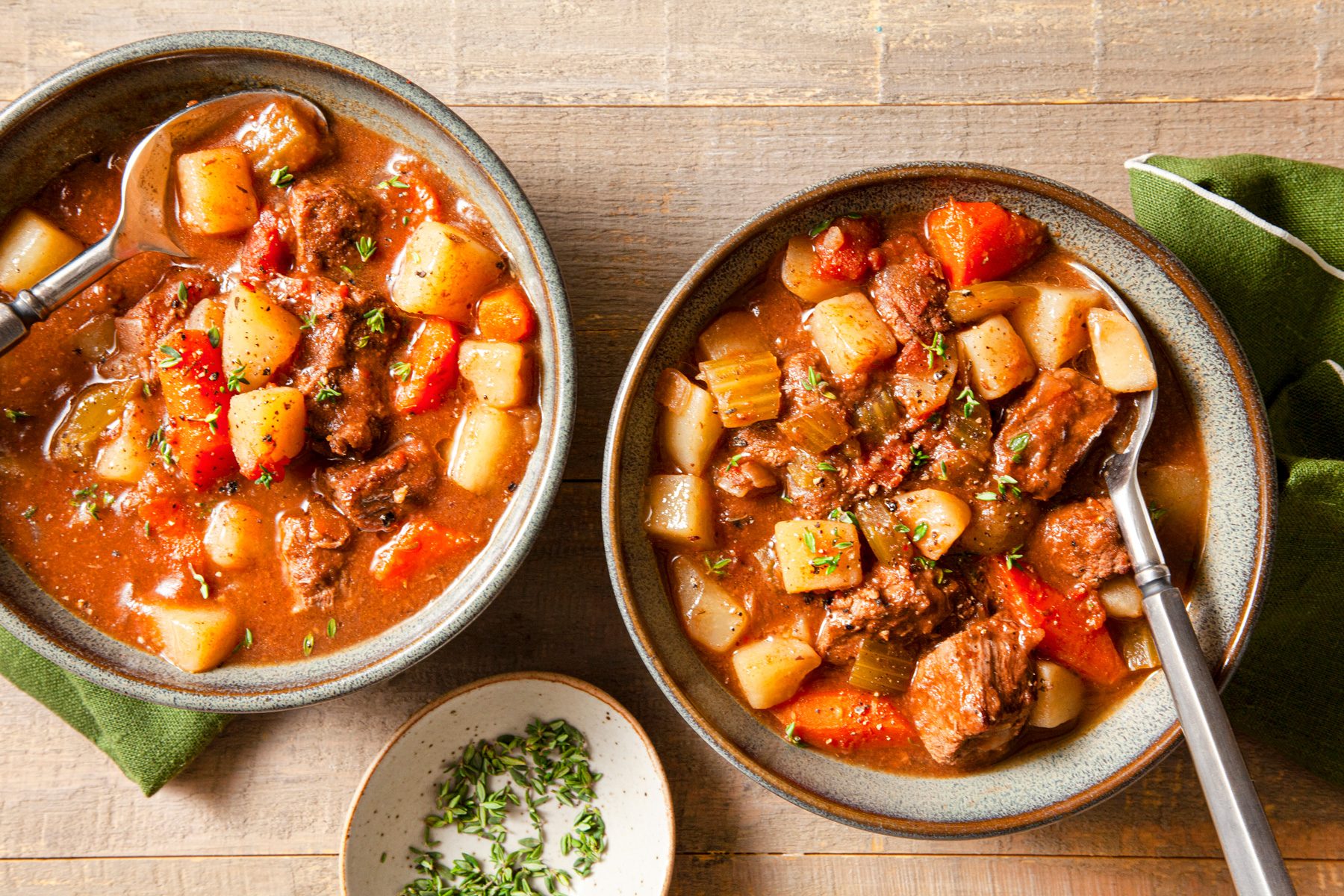 Two bowls of slow cooker beef stew
