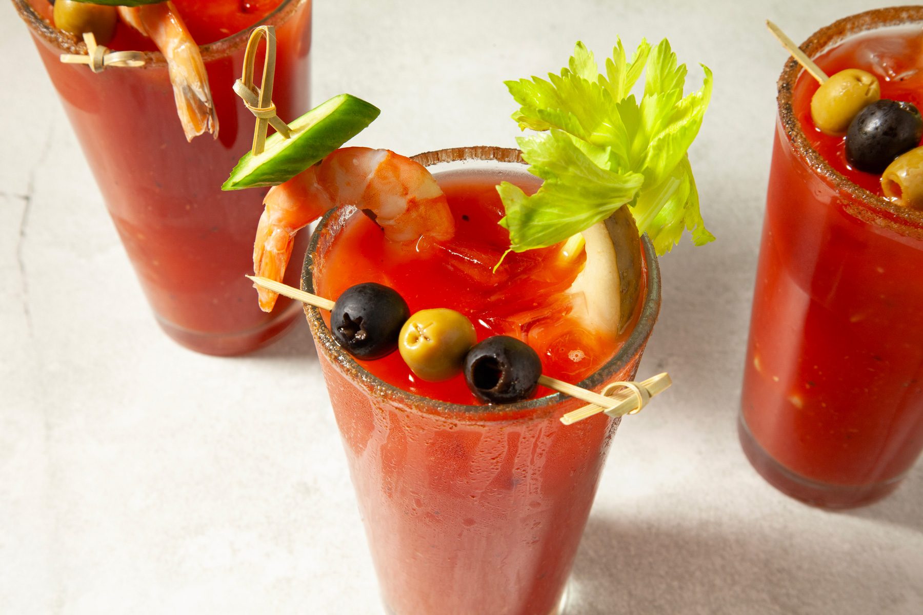 A bloody mary drink in a glass