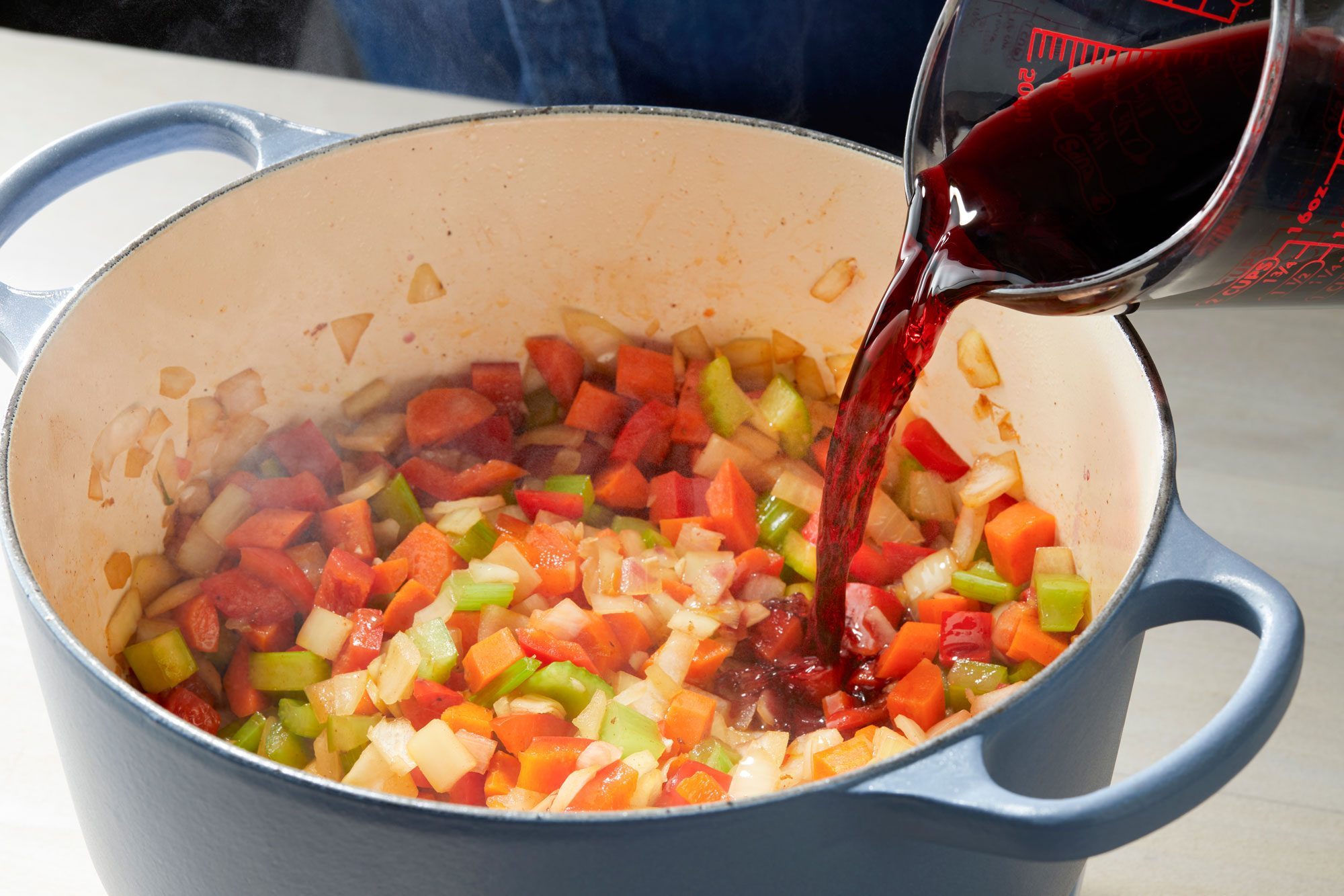 Adding wine to Dutch oven before reducing by half