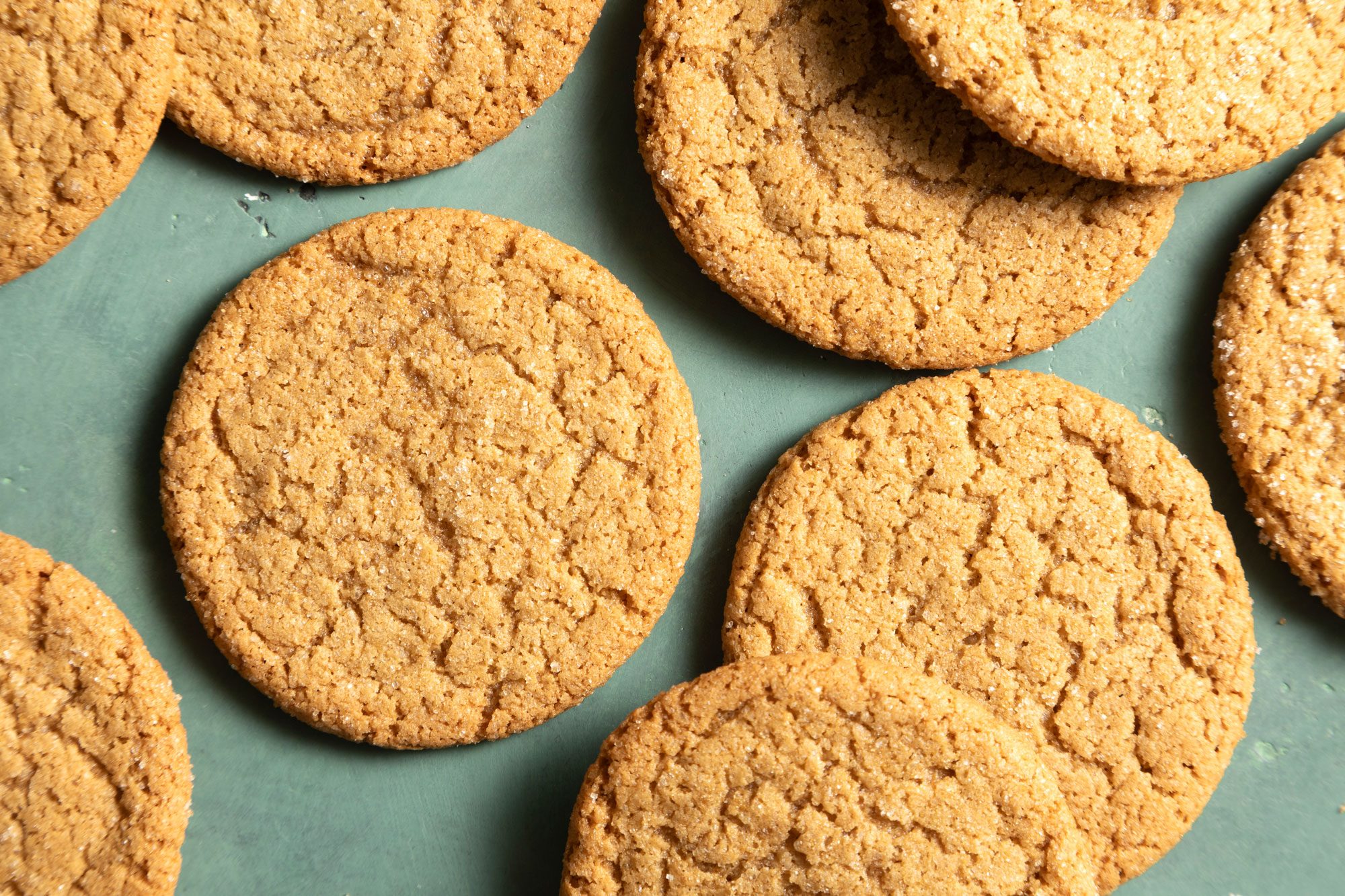 Crispy Brown Sugar Cookies on green background