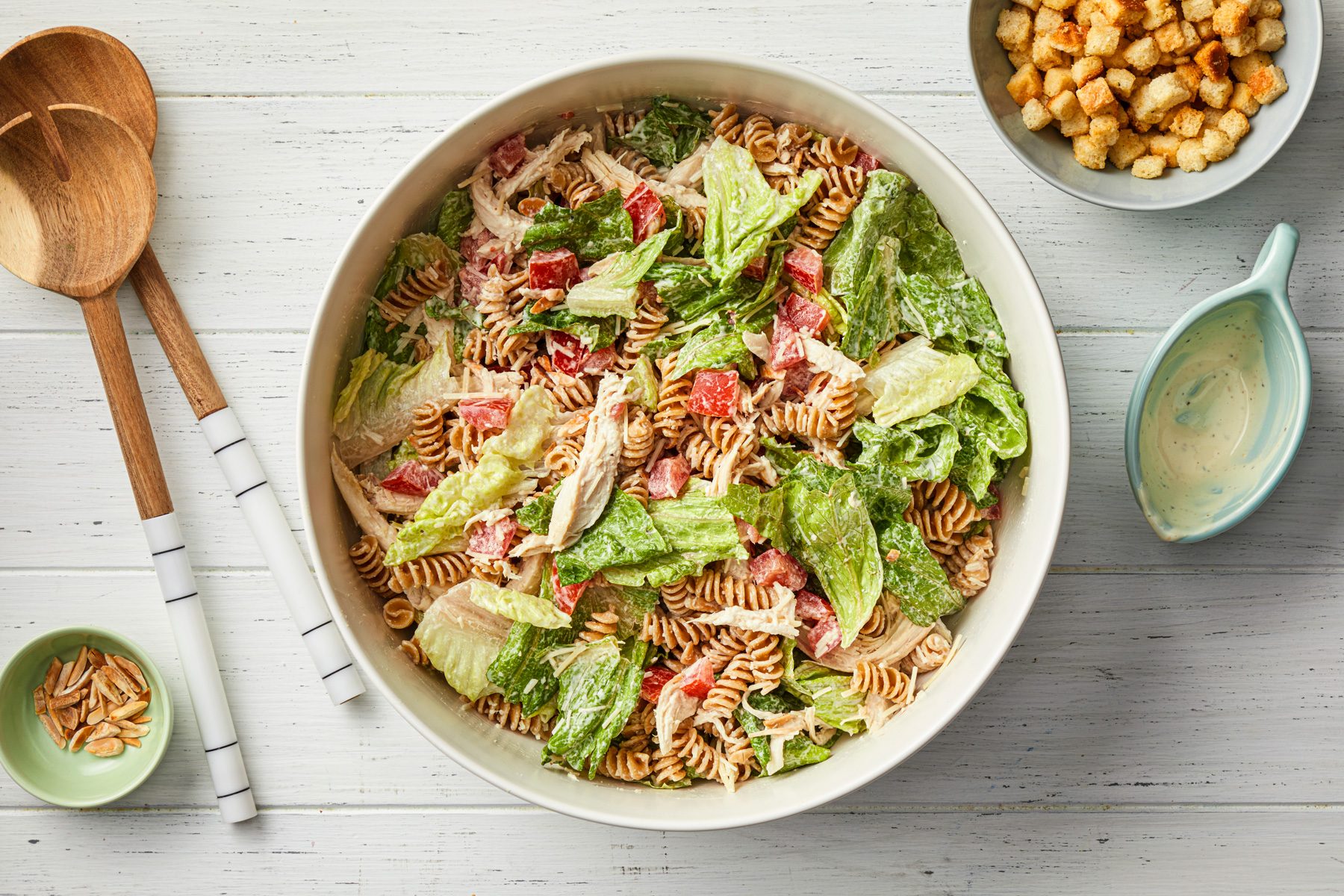 A bowl of Chicken Pasta Caesar Salad