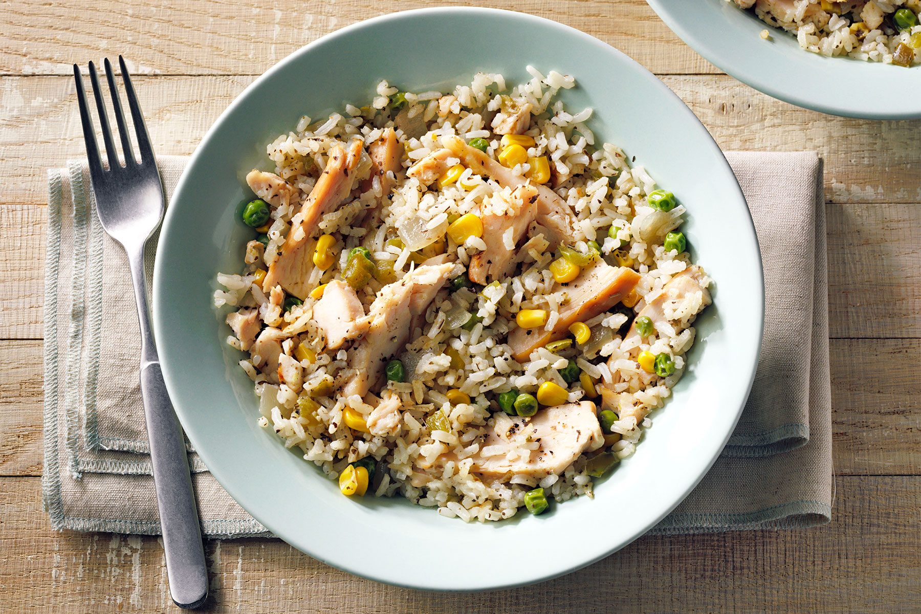 overhead shot of chicken rice bowl