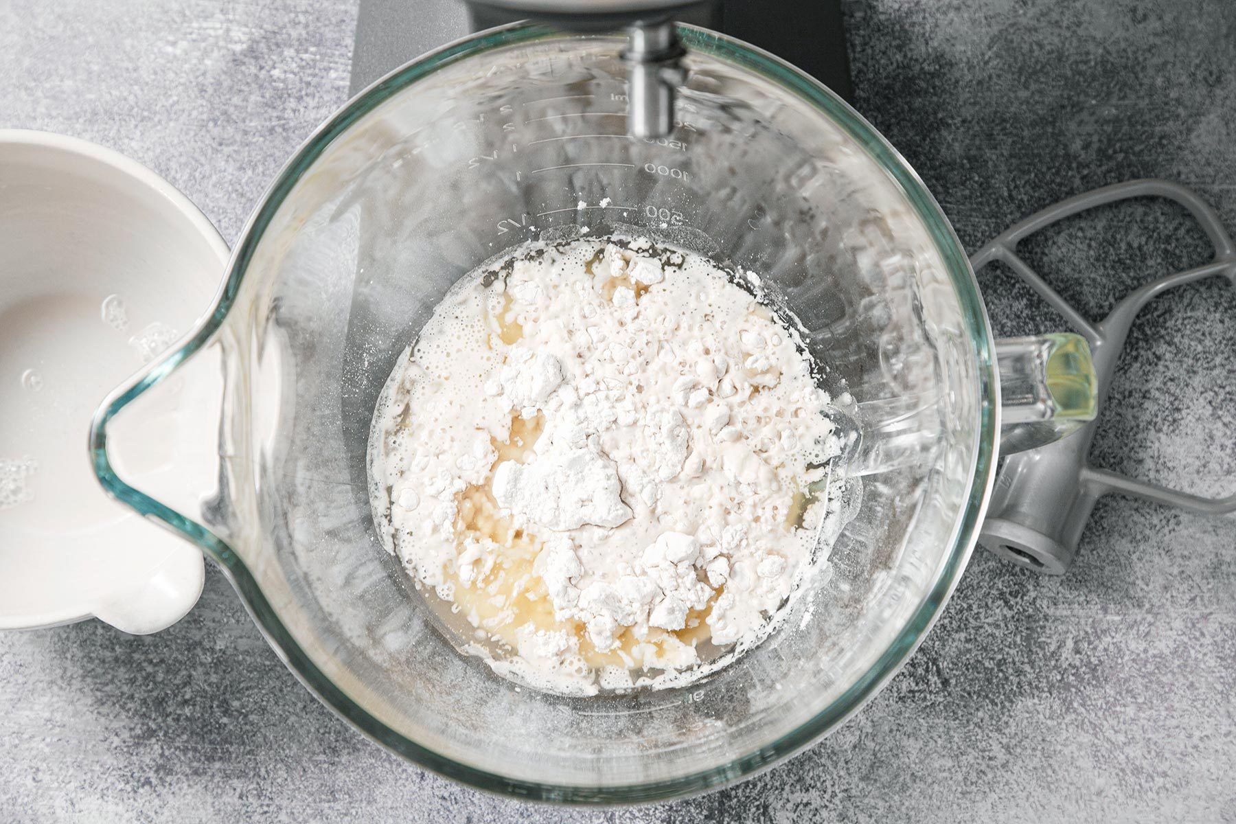 Mixing dry ingredients in yeast mixture