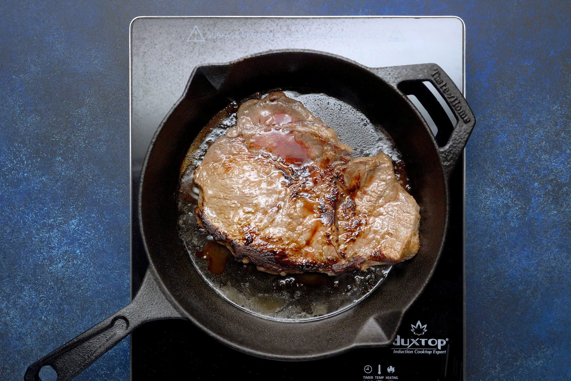Cook until steak reaches desired doneness in a large skillet