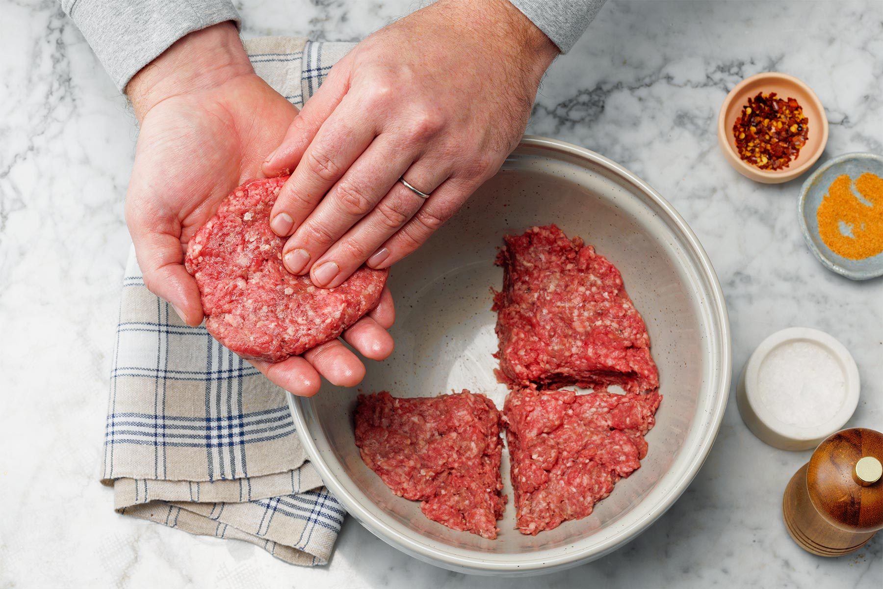 Shaping the meat into patty shapes