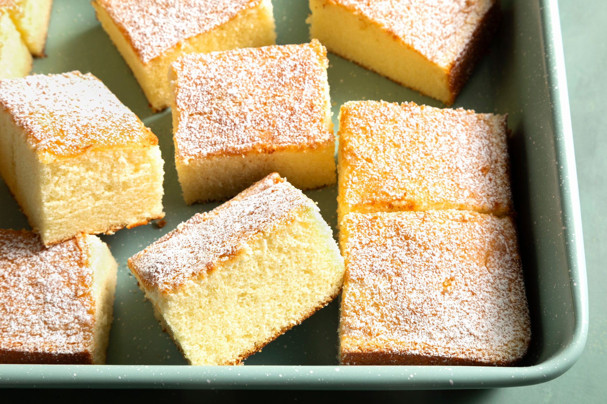 Fluffy Hot Milk Cake in a serving dish