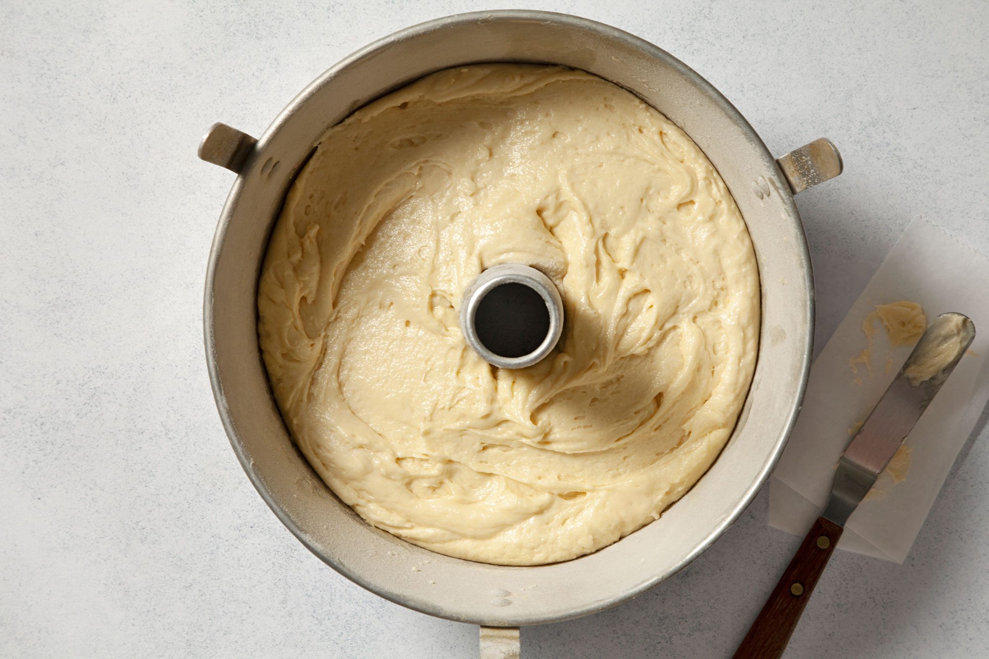 overhead shot of Kentucky Butter Cake batter in a tube pan