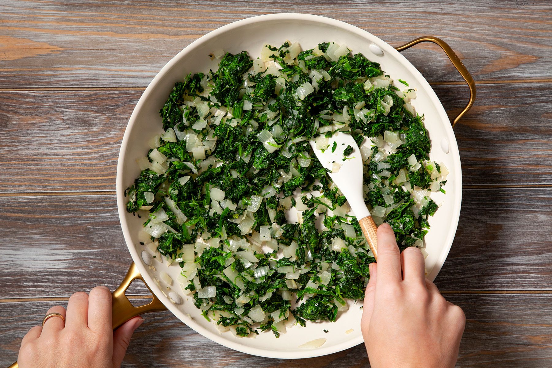 Cooking onions and spinach